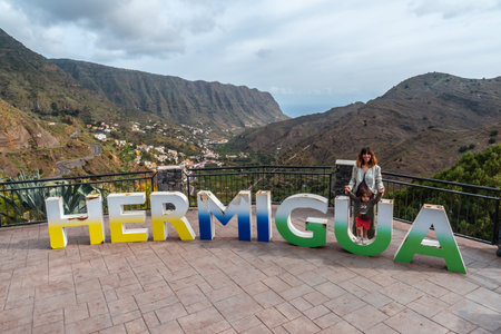 Visiting the letters at the viewpoint in the village of Hermigua in the north of La Gomera, Canary Islandsの写真素材