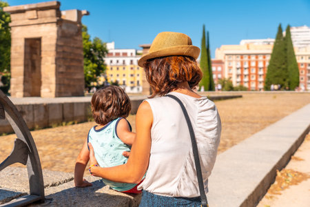 Temple of Debod in the city of Madrid of Egypt, mother and son visiting the ancient Egyptian temple