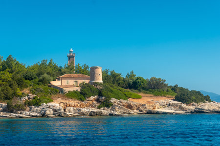 Venetian Lighthouse in Fiskardo village on Kefalonia island, Greeceの写真素材