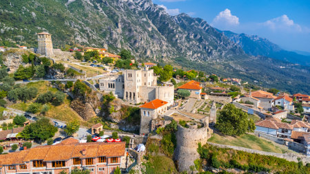 The beautiful Kruje Castle and its fortress seen from an aerial drone view, tower and the Kruje museum with the mountains in the background. Albaniaの写真素材