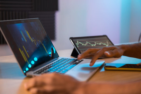 Close-up of the hands of a business man working alone in his office
