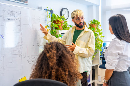 Young man using board to explain a project in a coworking