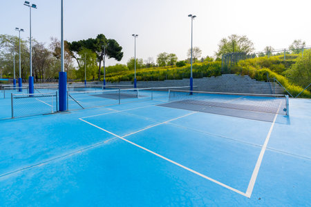 Outdoors sportive facilities with pickleball courts and no people in a sunny dayの写真素材