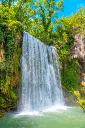Beautiful La Caprichosa waterfall in the Monasterio de Piedra Natural Park, Aragon, Spainの写真素材