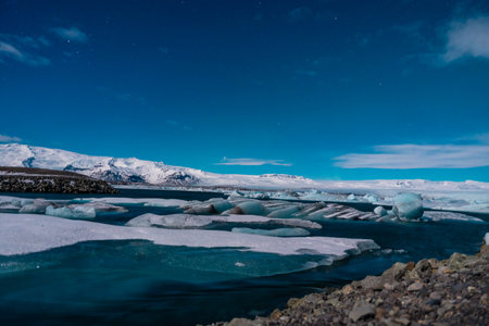 Panoramic view of Jokulsarlon ice lake at night in winter. Icelandの写真素材
