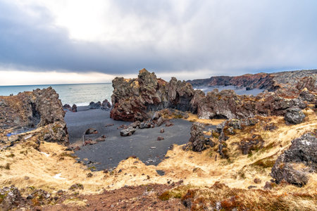 Picturesque Djupalonssandur beach on the Snaefellsnes peninsula in winter in Iceland