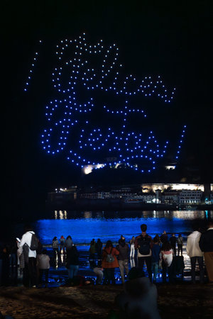 Drone show at night at the Christmas inauguration in San Sebastian, Gipuzkoa. Illuminated city and...