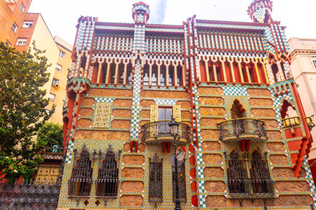Colorful facade of Casa Vicens, showcasing vibrant tiles and intricate ironwork, a prominent example of Catalan art nouveau architecture in Barcelona, Spainの写真素材