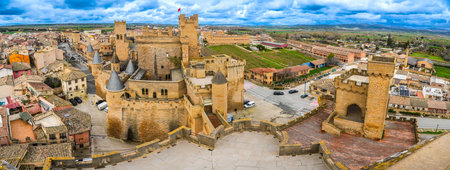 Capturing a panoramic view of the medieval royal palace of Olite, a luxurious fortification in Olite, Navarre, Spain, showcasing its stunning architecture and rich historyの写真素材