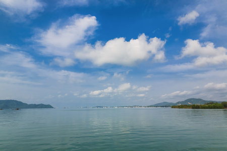 Fishing boat in the sea And the beautiful skyの写真素材