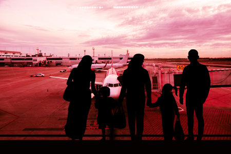 Airport silhouette with people traveling talking at the international airport departure terminal.の写真素材