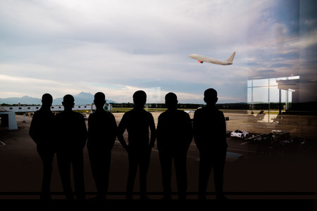 Silhouette of a businessman at the airportの写真素材