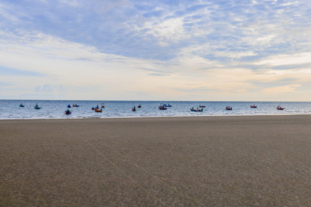 Small fishing boat, sand, sea and sky, fisherman's fishing boat in the morning sea. for backgroundの写真素材