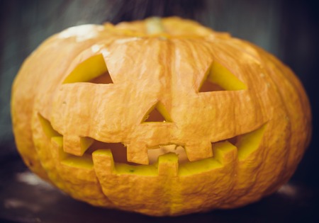 Halloween pumpkin on a gray background. Symbol.の写真素材