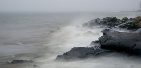 Foggy morning with stormy seas on Lake Superior.の写真素材