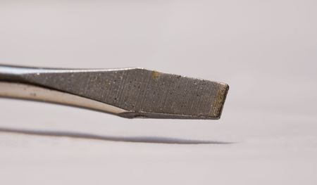 Screw driver close up of and old well used head.の写真素材