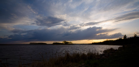 Wild Rice Lake sky with storm clouds in northern Minnesotaの写真素材
