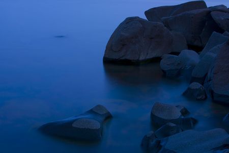 Night, water, and stone on the North Shore of Lake Superiorの写真素材