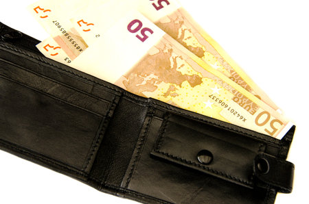 50 Euros in black purse. White background. Isolated.