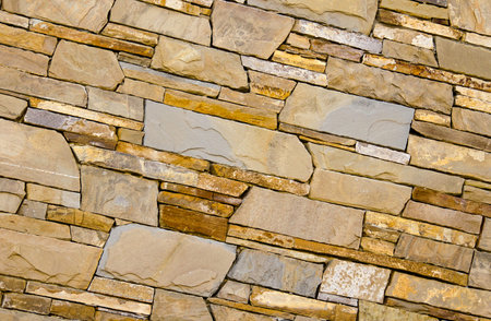 The texture of multicolored bricks. Close-up.