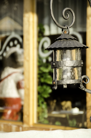 Old iron lantern on blurred background. Close-up.の写真素材