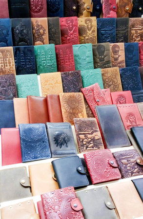 Countertop with colorful purses.