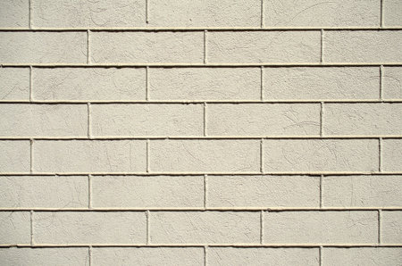 Old gray painted brick wall. Close-up.