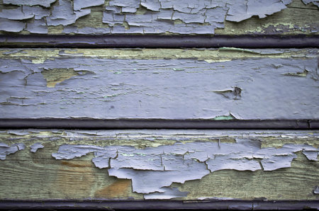 Boards with an old cracked paint. Close-up.の写真素材