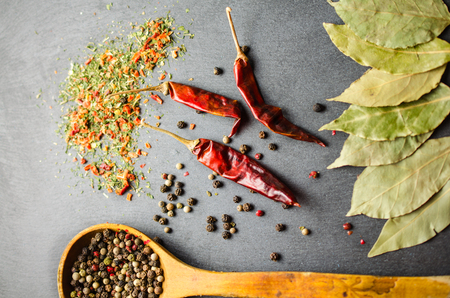 Various spices on a black surface. Close-up.の写真素材
