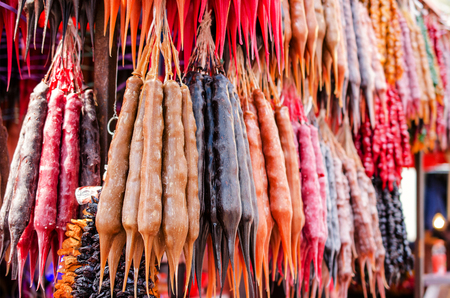 Traditional asian dessert churchkhela at street market in Georgia on the counter.の写真素材