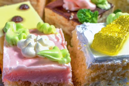 Assorted colorful natural sweet cakes. Concept of tasty cakes. Food background. Close-up.の写真素材