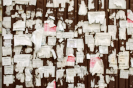 Abstract background. Defocused image of a wall or billboard outdoors. Artistic blur. Close-up.