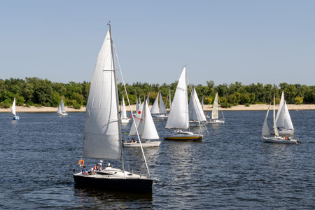 Kiev, Ukraine, August 2018: - many beautiful floating sail yachts medium size with crew , on the...