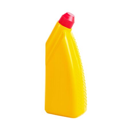 Yellow bottle with detergent in plastic container for house or medical clean. Cleaning equipment. Blank label. Isolated on white background. Close-up.の写真素材
