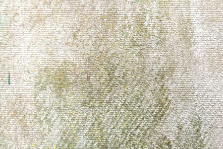 Gray plaster. Ancient weathered wall with gray background old building. Old concrete wall. Abstract rough texture. Close-up. Soft focus. Outdoors.の写真素材