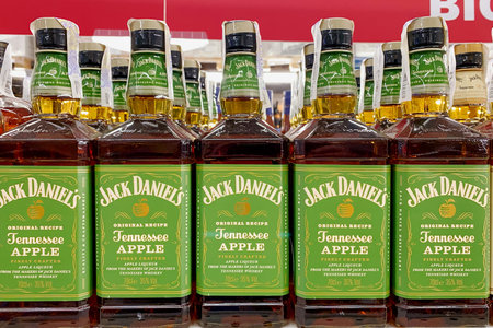 Kyiv, Ukraine, 11 July, 2023: - Bottles of Jack Daniels Tennesse Apple brand of luxury whisky for sale.のeditorial素材