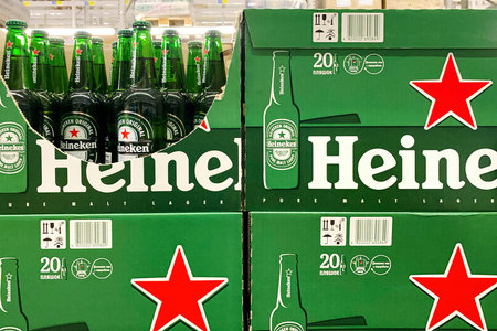 Kyiv, Ukraine, September 24, 2023: - Heineken beer brand stacked on large packs on shelw in...