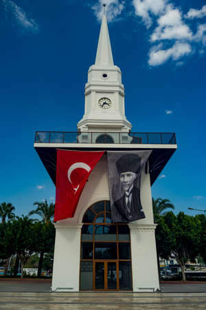 Kemer, Turkey-October 20, 2020: The clock tower in Kemer on Kemal Ataturk square. Sunny summer day.のeditorial素材