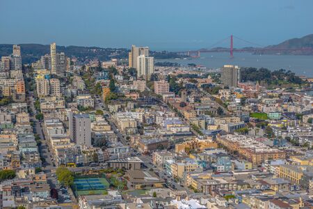 Lombard Street in front of Golden Gate Bridgeの写真素材