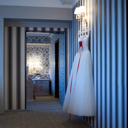 wedding dress hanging houses morning brideの写真素材