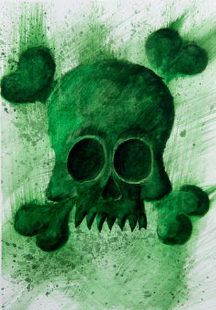 green skull with teeth and criss-crossed bonesの写真素材
