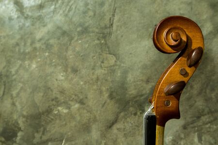  violin on concrete background. vintage style.の写真素材
