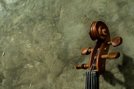  violin on concrete background. vintage style.の写真素材