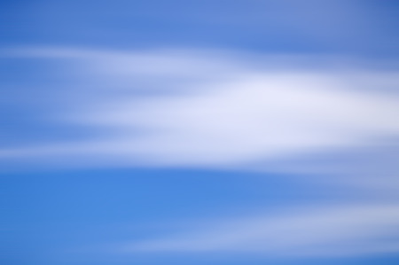 Long Exposure Of Blue Sky With Motion Clouds For Backgroundの写真素材