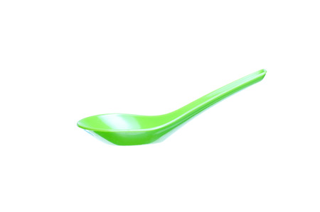 Green Soup Spoon Isolated On Whiteの写真素材