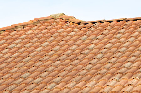 roof tile pattern over blue sky.