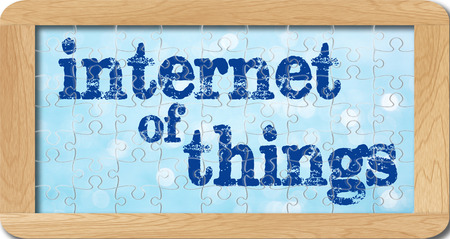jigsaw puzzle of internet of things iot in wooden frame.の写真素材