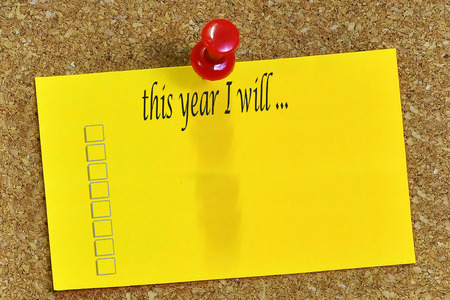 this year I will word on notepaper with cork background.の写真素材