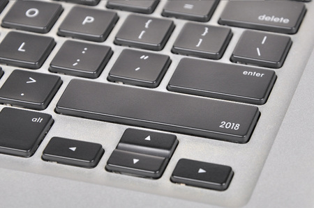 The computer keyboard button written word 2018の写真素材