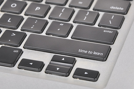 The computer keyboard button written word  time to learn.の写真素材